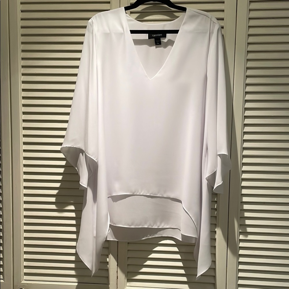 Karen Kane asymmetrical v neck white 3/4 sleeve blouse